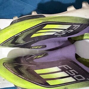 adidas athletic soccer cleats . F50+ with active lights trike technology